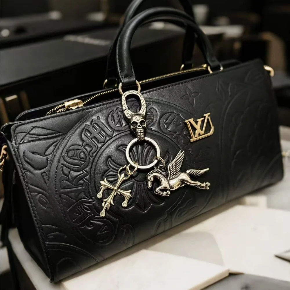 Chrome Hearts Silver Skull Clip Keychain with Pegasus and Cross Charms